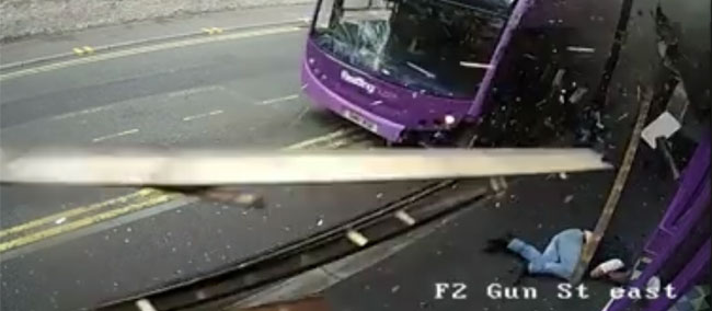 Man is knocked flat by a Reading No.17 bus, gets up and walks into a bar
