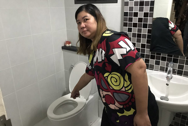 Woman in Thailand is bitten on the bum by a python down her toilet. Twice.