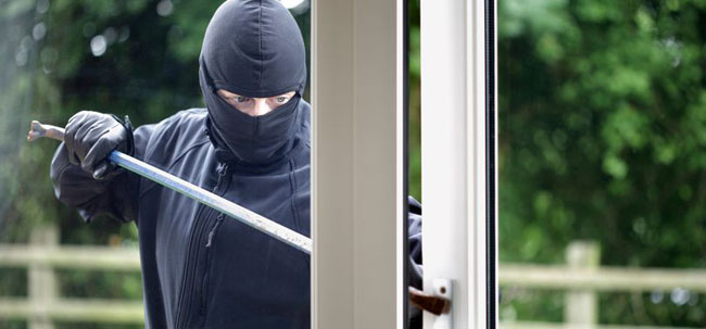 All burglars are ninjas, and hackers wear hoodies – The Rise of the Local Newspaper Stock Photo