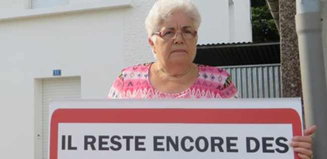 French woman is so angry she’s made a sarcastic sign after third car crashes into her house in three years