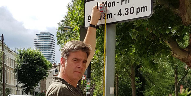 Man who banged his head is on a mission to measure all the road signs in Wandsworth