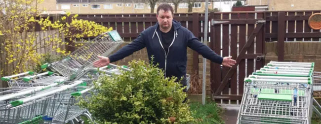 So many questions as local councillor keeps supermarket trolleys in what appears to be his garden